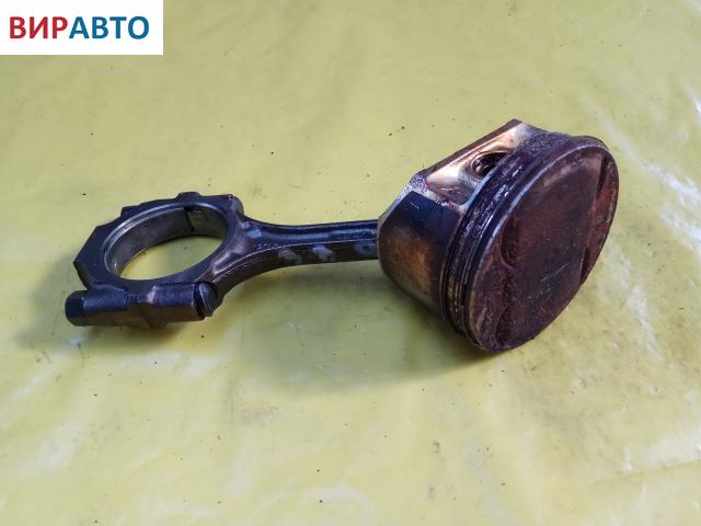 Поршень